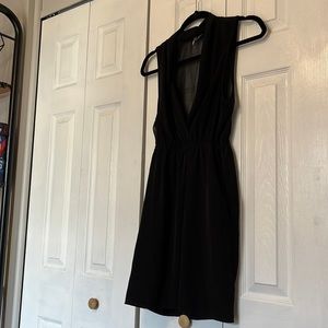 Sheer back, plunging neckline, POCKETS